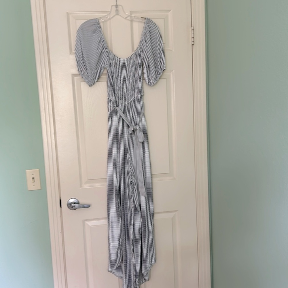 Black and White striped Jumpsuit by Dress Forum in size M.